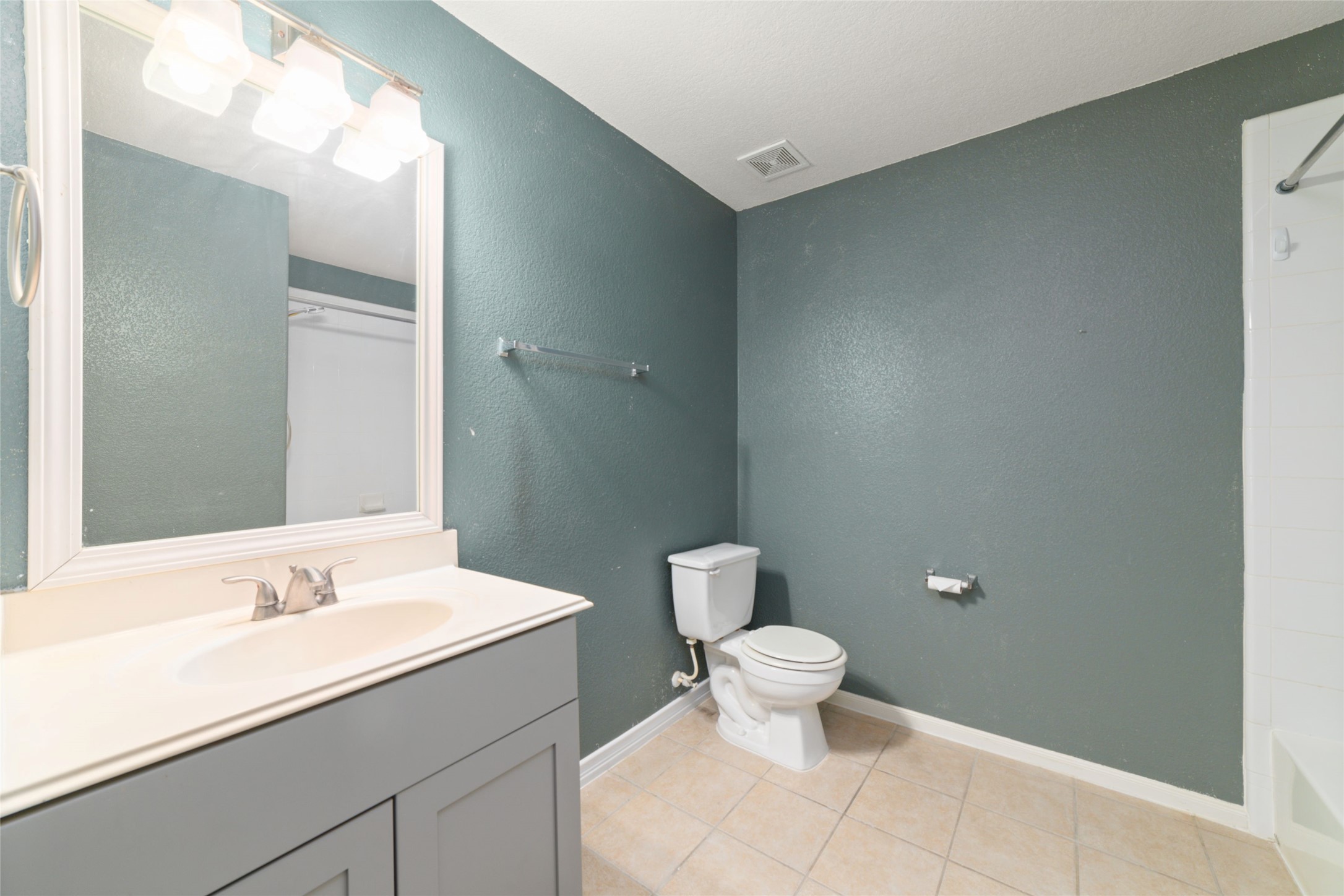 21311 Shadow River Lane Spring, TX 77379 - Photo 36 of 38 a bathroom with a sink and a toilet