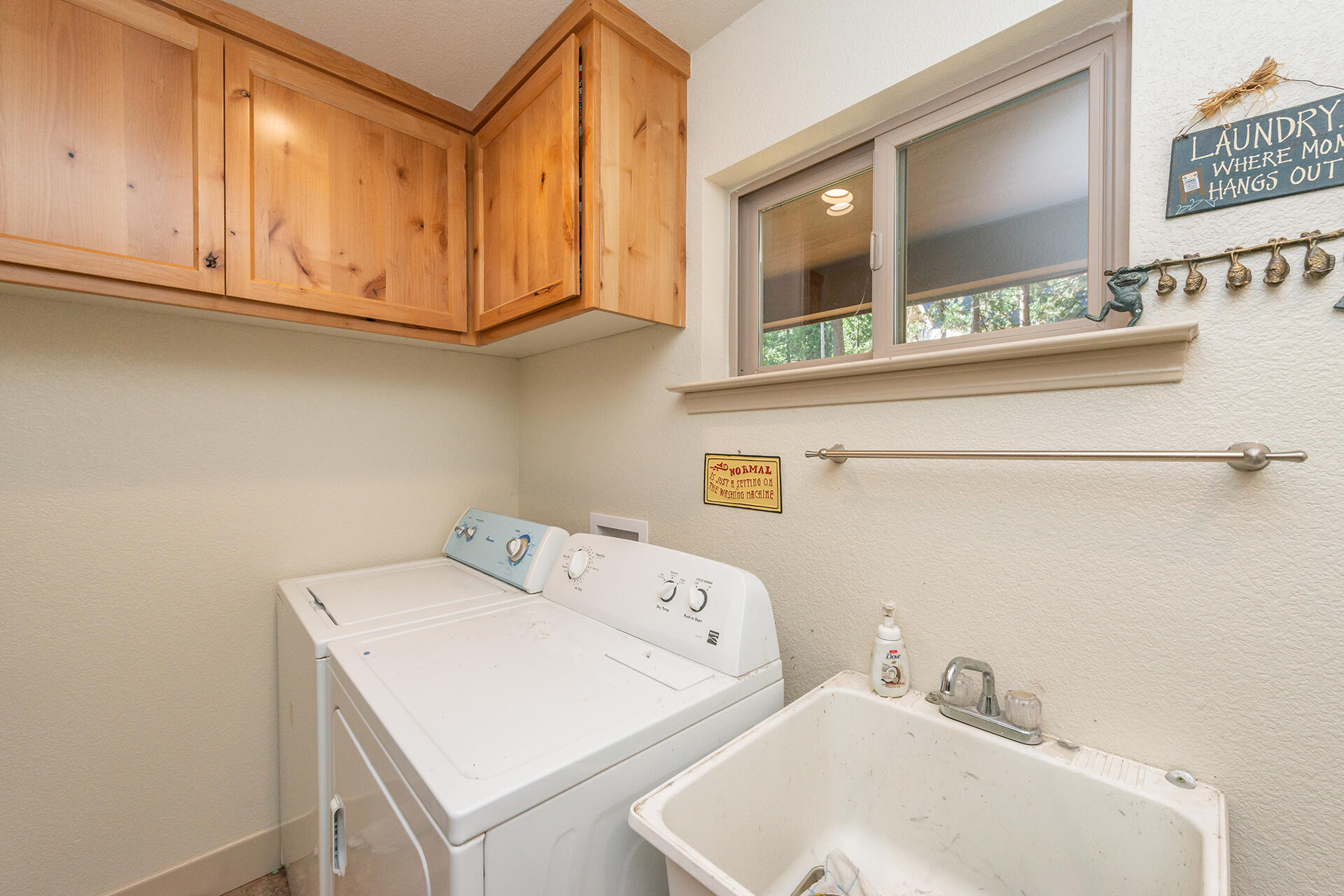 851 Mountain Aire Road Trinity Center, CA 96091 - Photo 26 of 54 a utility room with dryer and washer