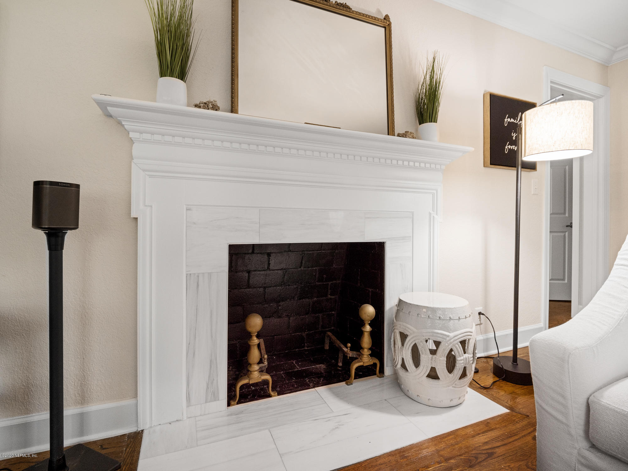 6319 Wesleyan Road Jacksonville, FL 32217 - Photo 7 of 24 a living room with furniture and a fireplace