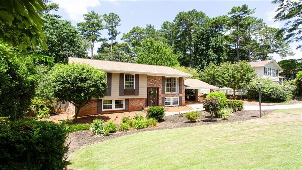 2814 Goodfellows Road Tucker, GA 30084 - Photo 5 of 46 front view of a house with a yard