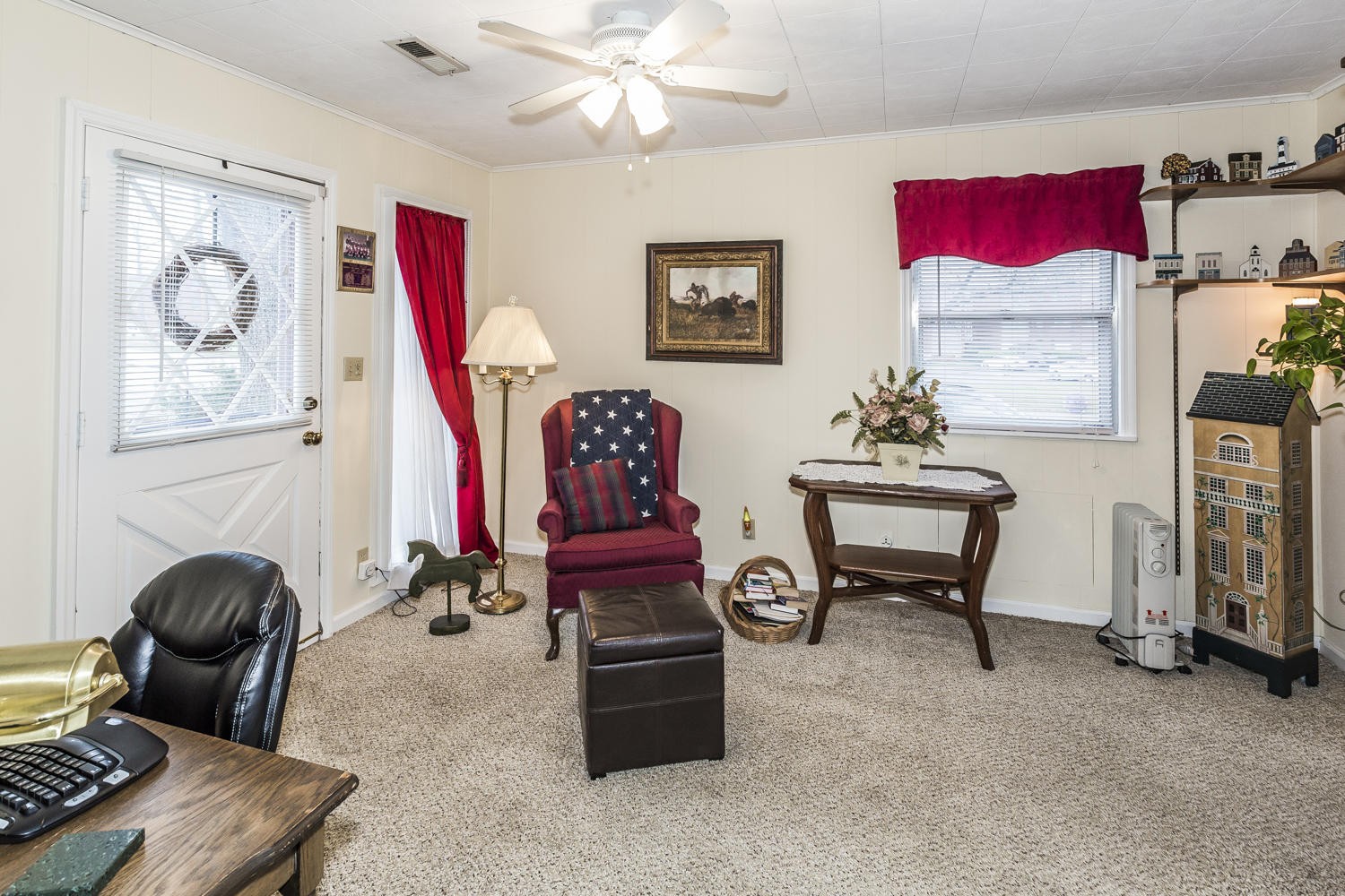 101 Parsons Road Oak Ridge, TN 37830 - Photo 26 of 31 a living room with furniture a rug and a window