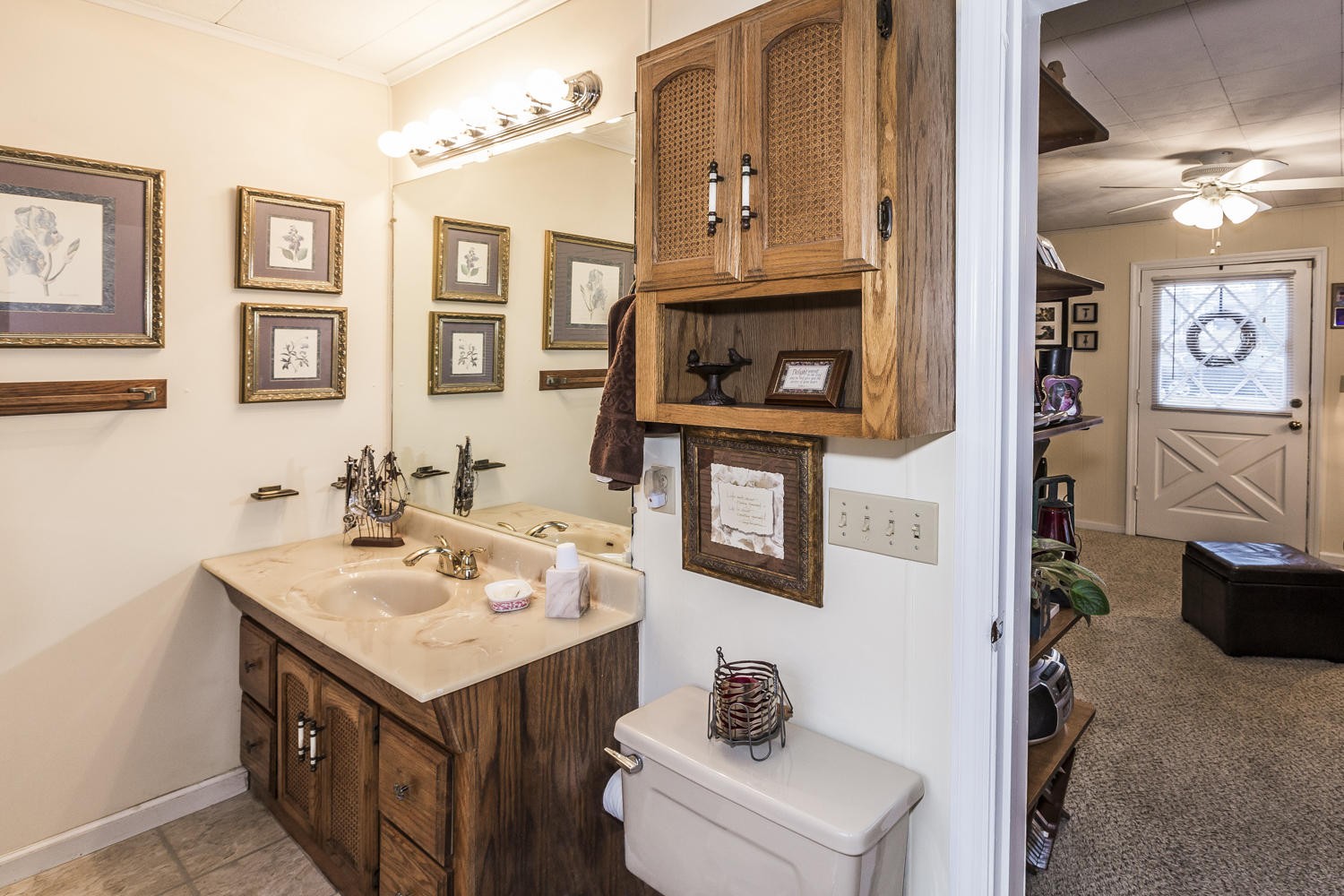 101 Parsons Road Oak Ridge, TN 37830 - Photo 29 of 31 a bathroom with a sink a mirror and a toilet