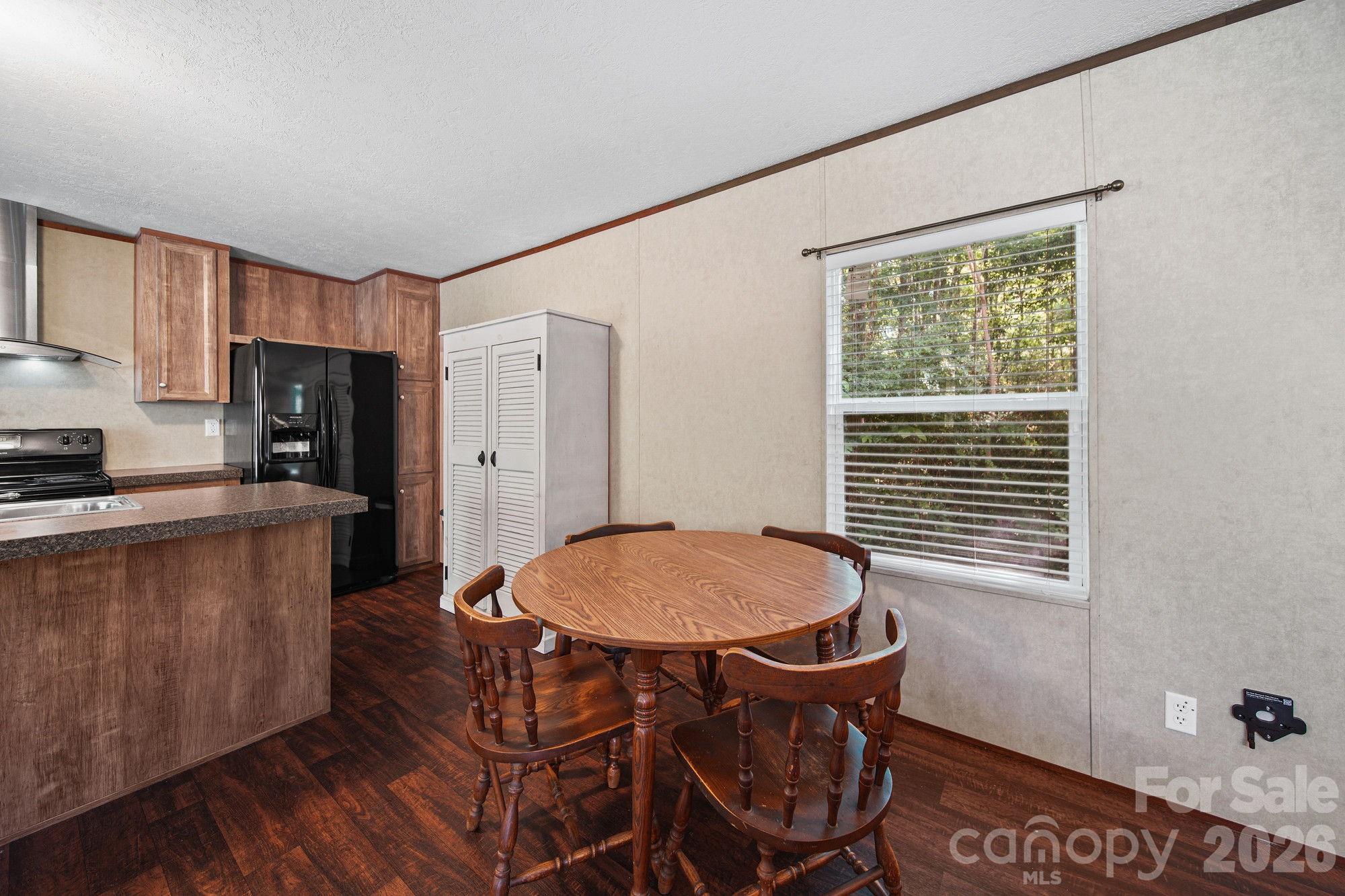 4507 White Store Road Wingate, NC 28174 - Photo 15 of 29 a dining room with furniture and window