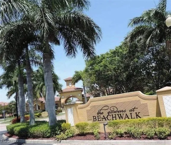 a view of a park with large trees