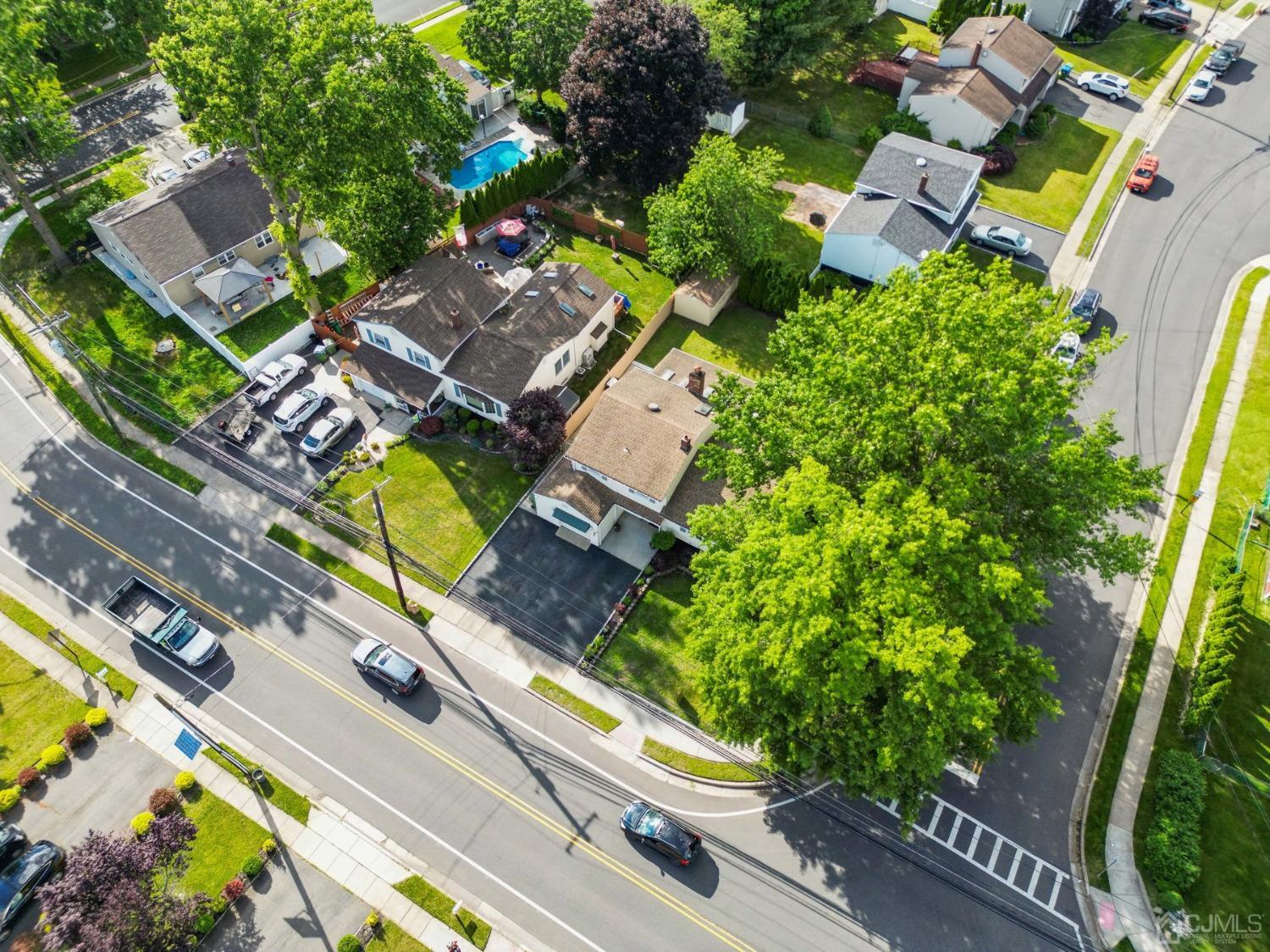 418 Durham Avenue Edison, NJ 08817 - Photo 25 of 30 an aerial view of a swimming pool with outdoor seating and yard