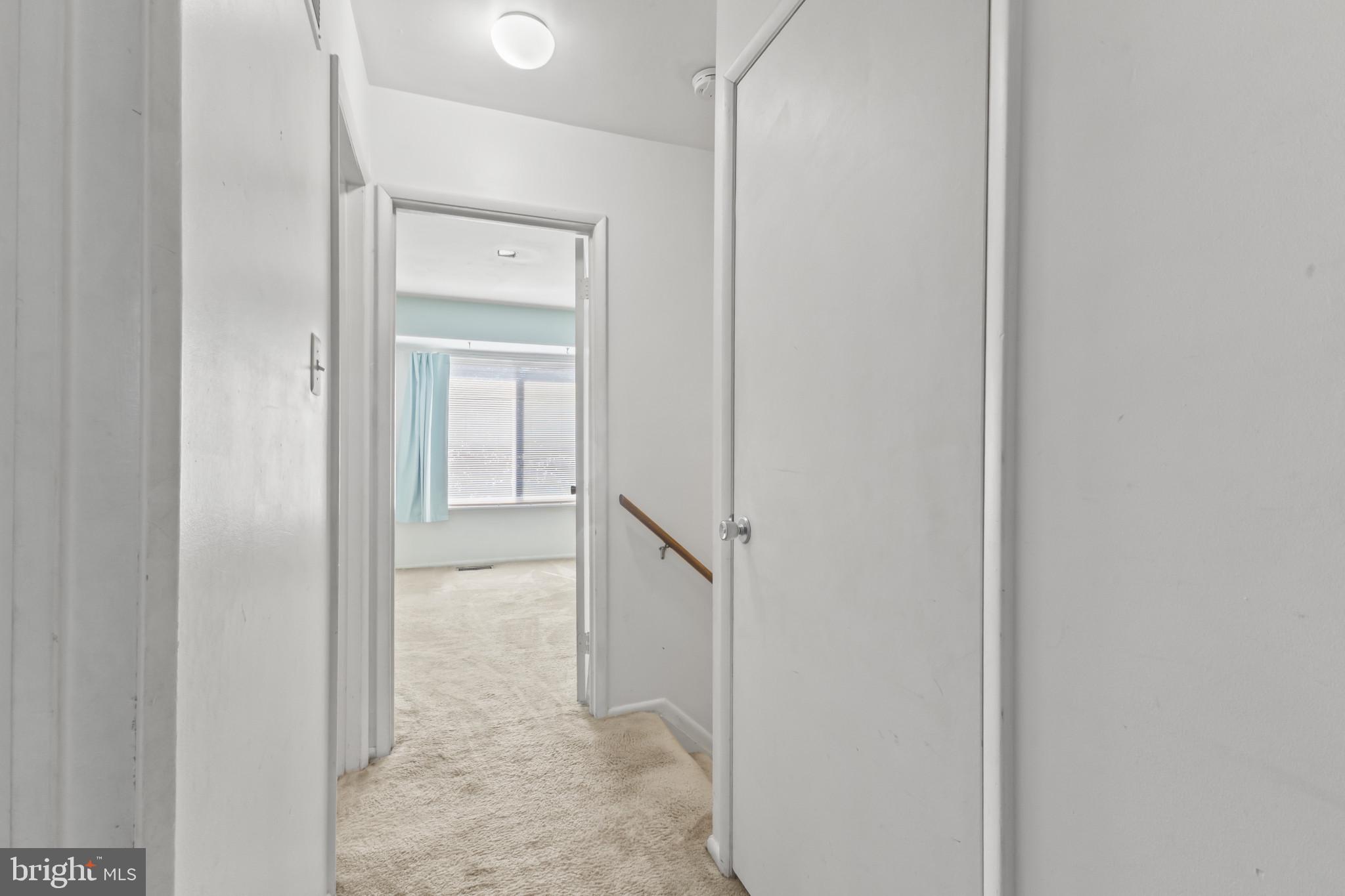 1808 Westwind Way, Unit 79 McLean, VA 22102 - Photo 12 of 24 a view of a hallway with a white walls