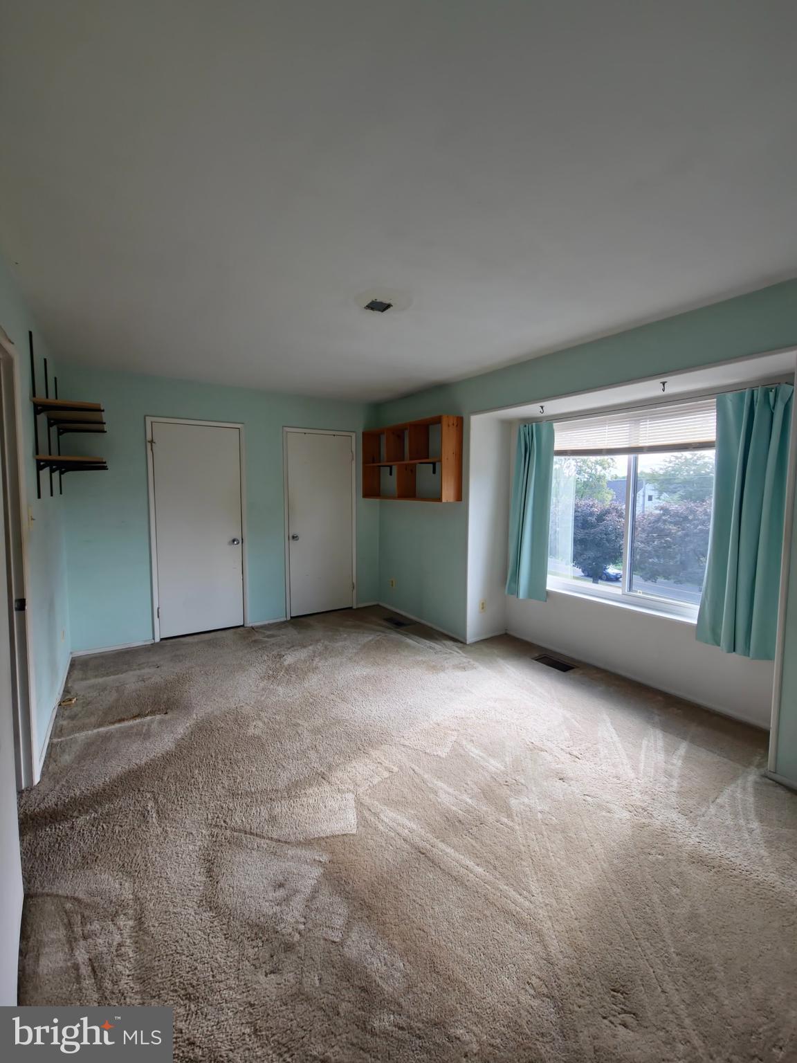 1808 Westwind Way, Unit 79 McLean, VA 22102 - Photo 17 of 24 a view of an empty room with a window