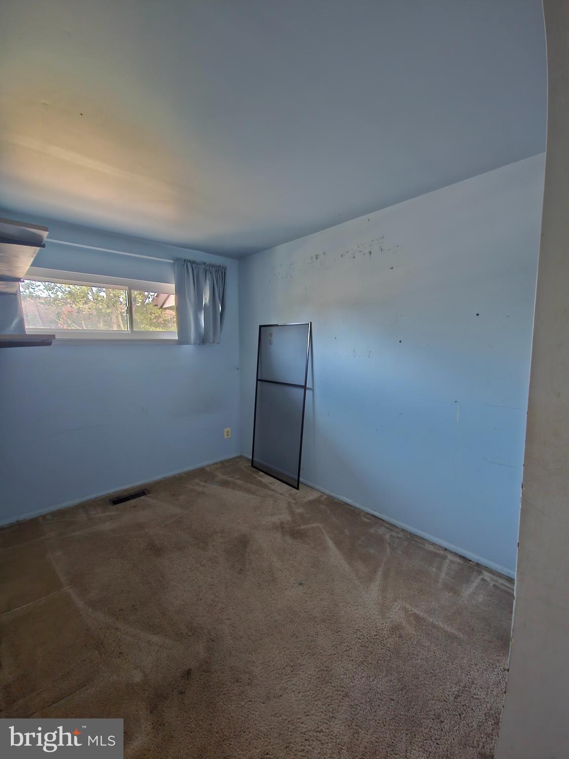1808 Westwind Way, Unit 79 McLean, VA 22102 - Photo 18 of 24 a view of an empty room with a window