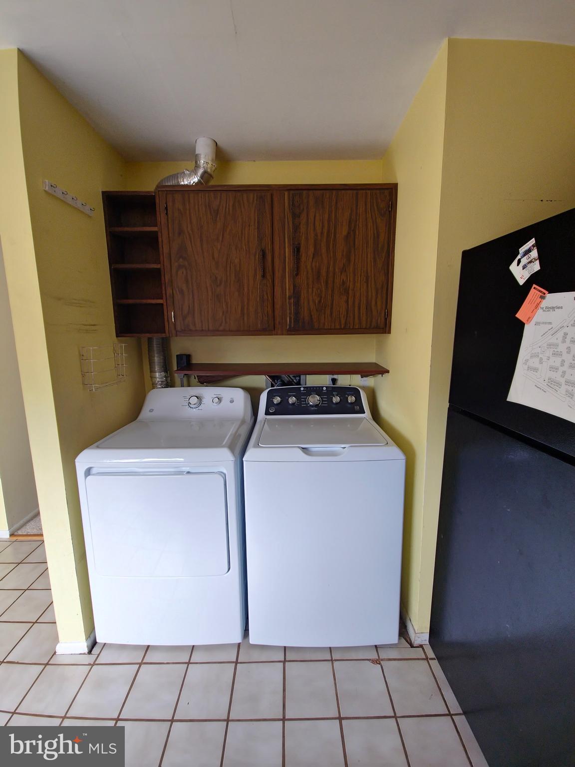 1808 Westwind Way, Unit 79 McLean, VA 22102 - Photo 21 of 24 a utility room with dryer and washer