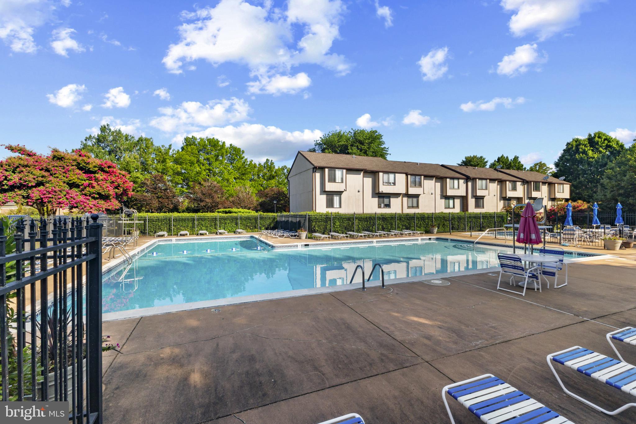 1808 Westwind Way, Unit 79 McLean, VA 22102 - Photo 7 of 24 a view of a patio with swimming pool