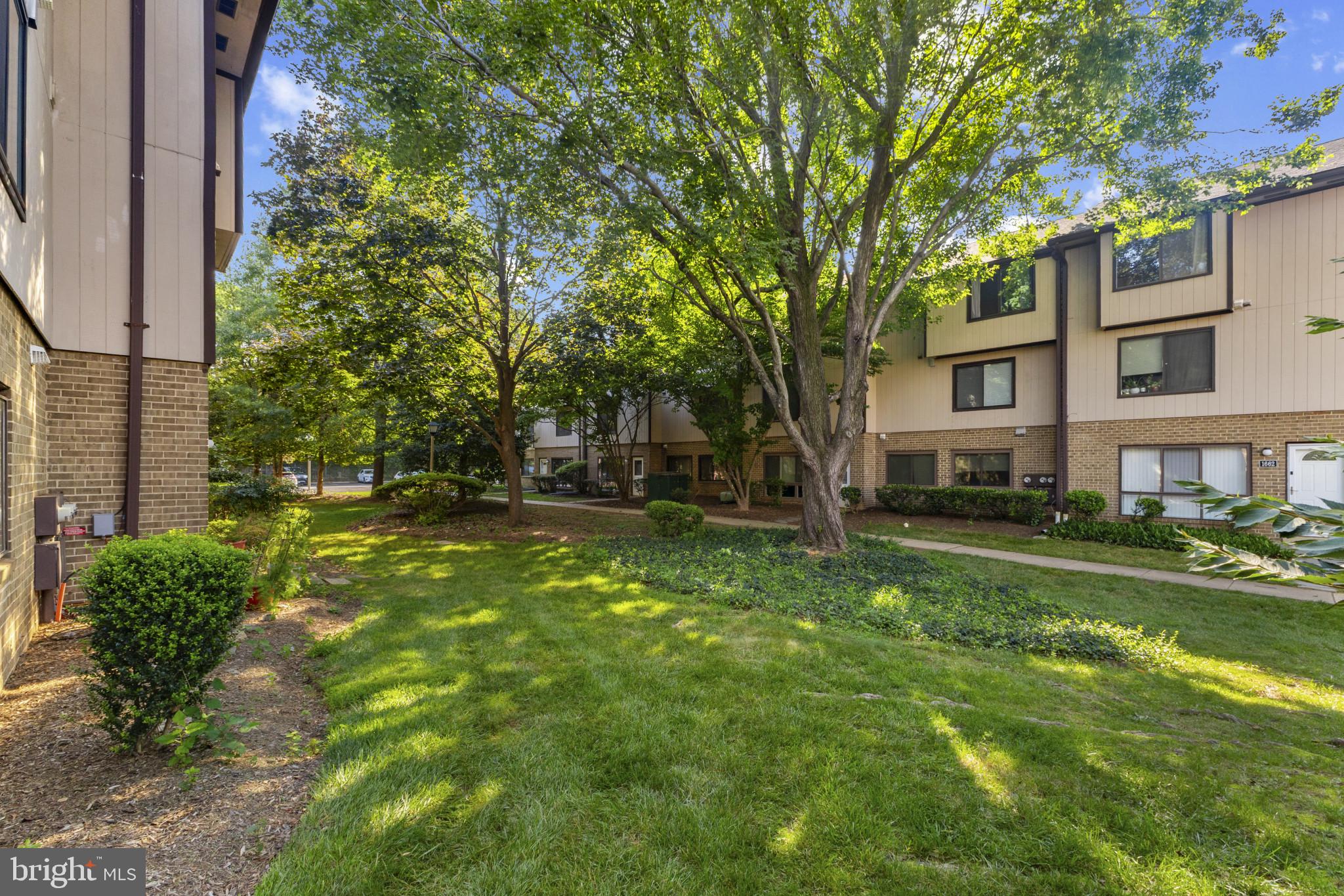 1808 Westwind Way, Unit 79 McLean, VA 22102 - Photo 10 of 24 a view of a house with a yard