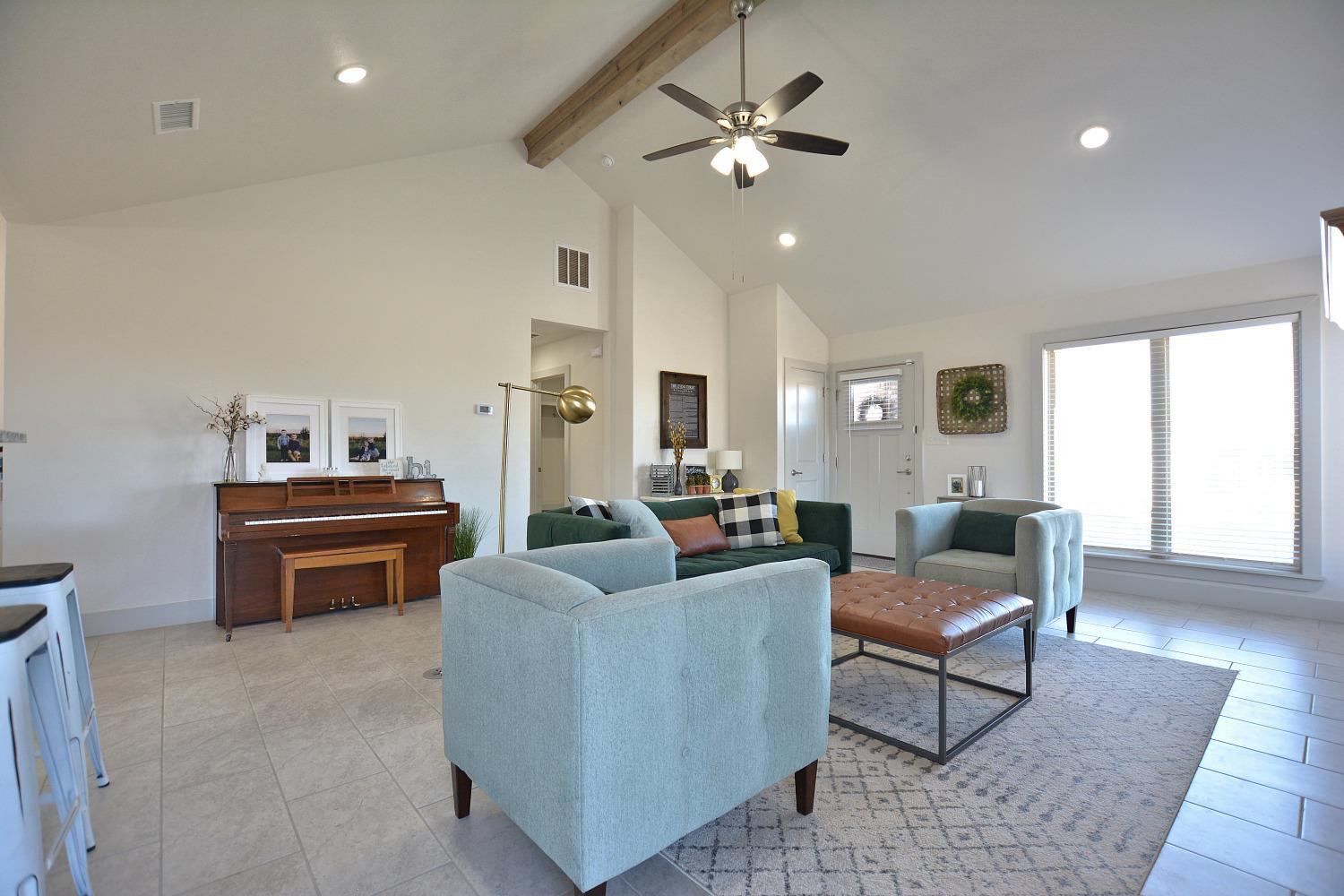 8901 Winfield Avenue Lubbock, TX 79424 - Photo 5 of 22 a living room with furniture and a rug