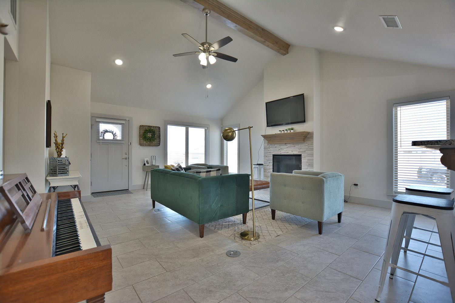8901 Winfield Avenue Lubbock, TX 79424 - Photo 6 of 22 a living room with furniture and a fireplace