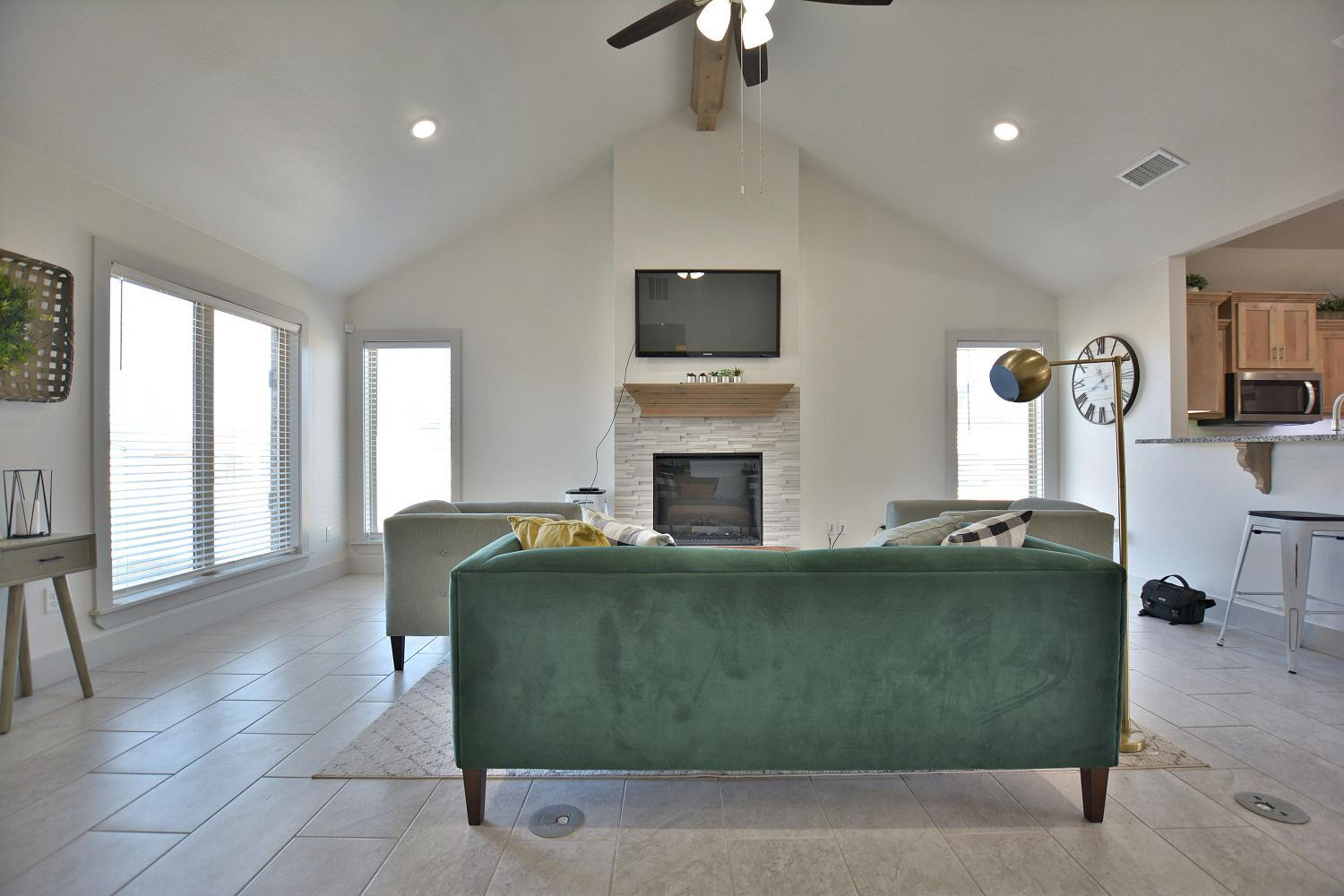 8901 Winfield Avenue Lubbock, TX 79424 - Photo 7 of 22 a living room with furniture and a fireplace
