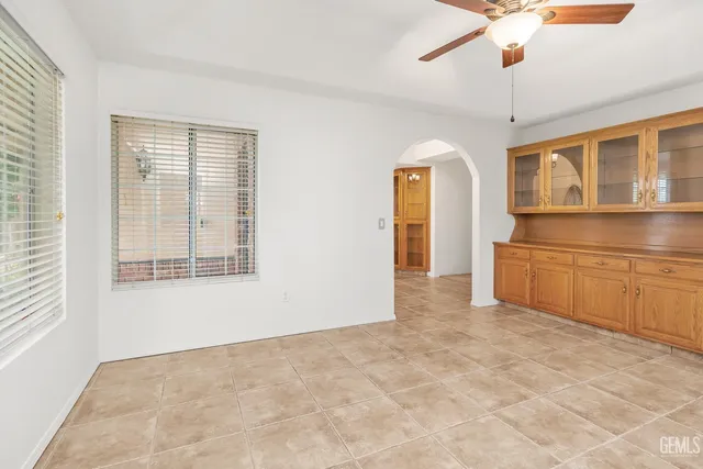 a view of a house with a yard porch and sitting area