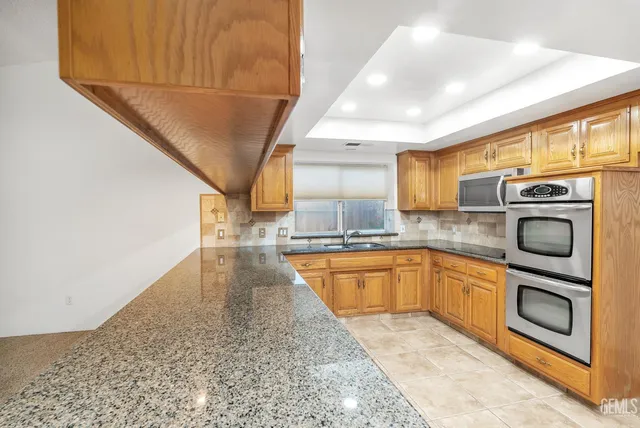 a front view of house with garden