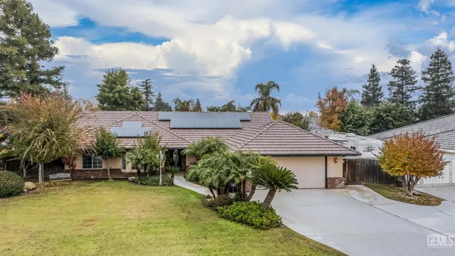 a view of a kitchen with a sink and cabinets