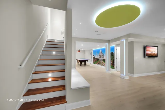 an aerial view of a house with yard swimming pool and outdoor seating