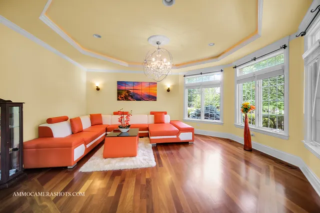 a view of entryway dining room and hall with wooden floor