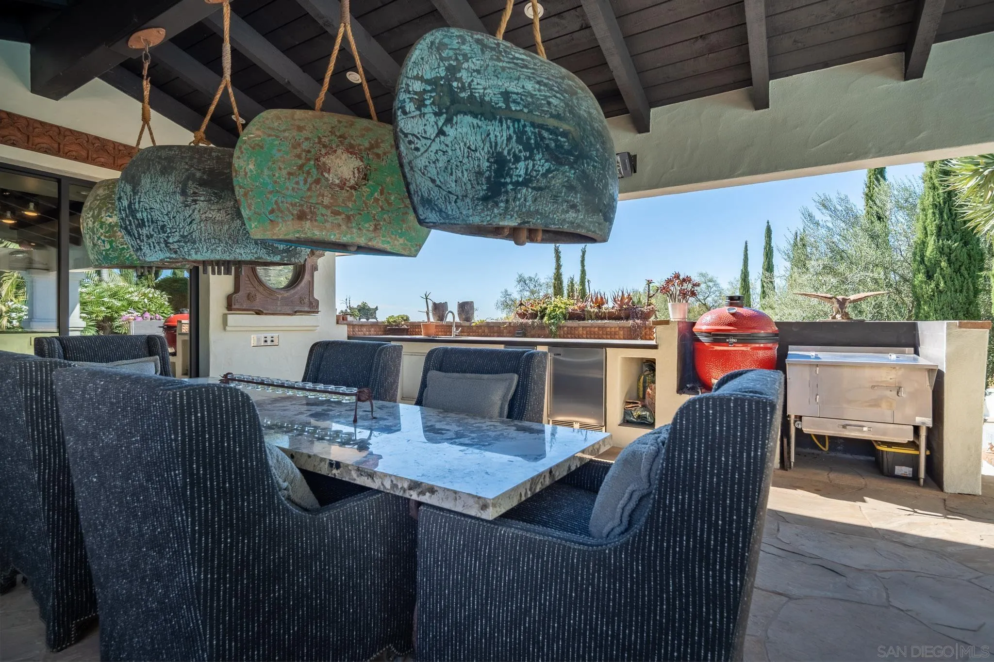 18245 Paseo Victoria Rancho Santa Fe, CA 92067 - Photo 17 of 40 a dining room with furniture and wooden floor