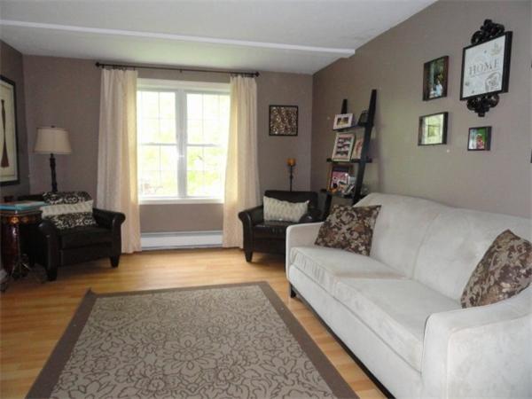 54 Clarke Road Needham, MA 02492 - Photo 4 of 29 a living room with furniture and a rug