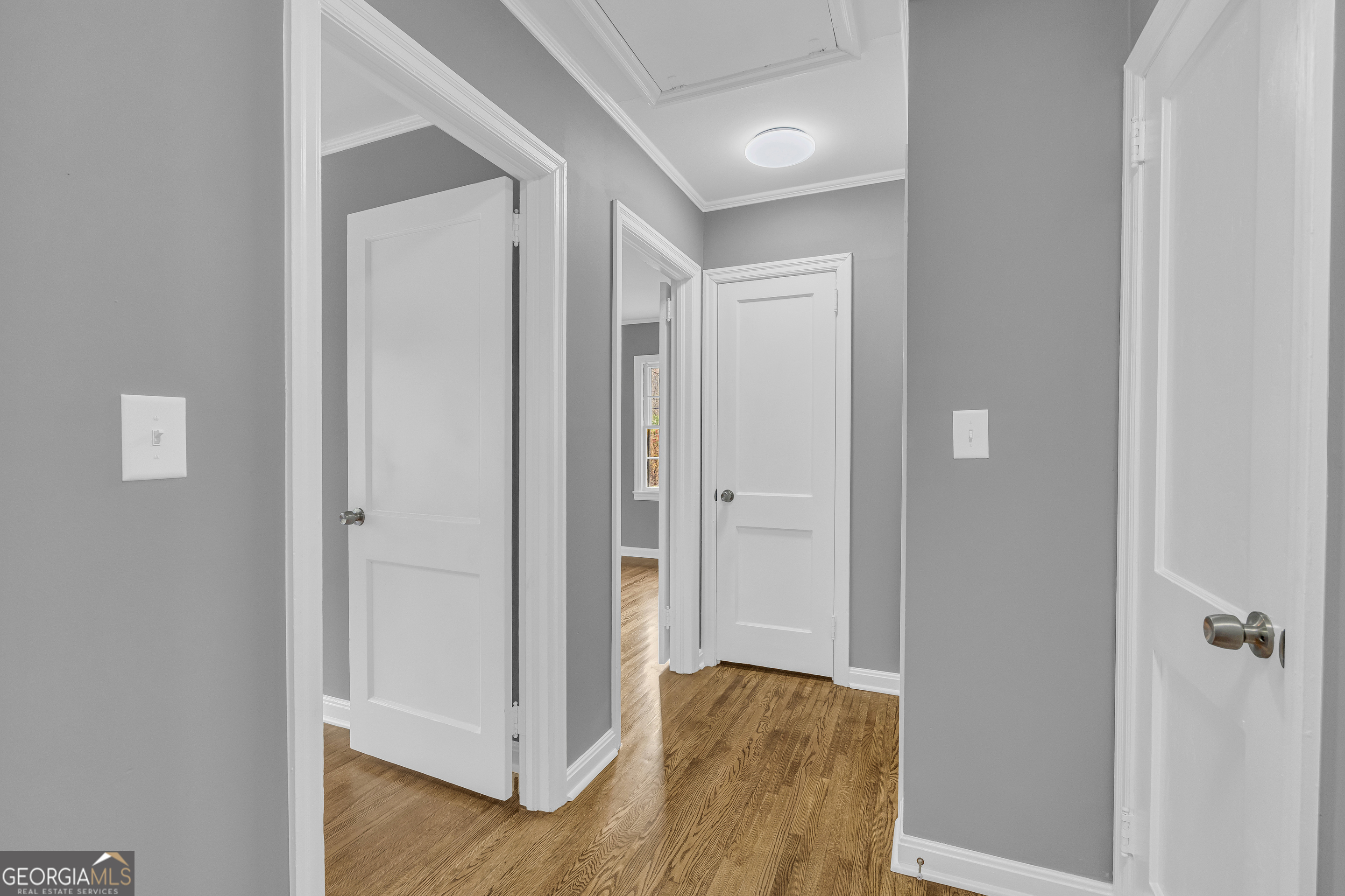 998 Rosedale Street Toccoa, GA 30577 - Photo 22 of 43 a view of a hallway with wooden floor
