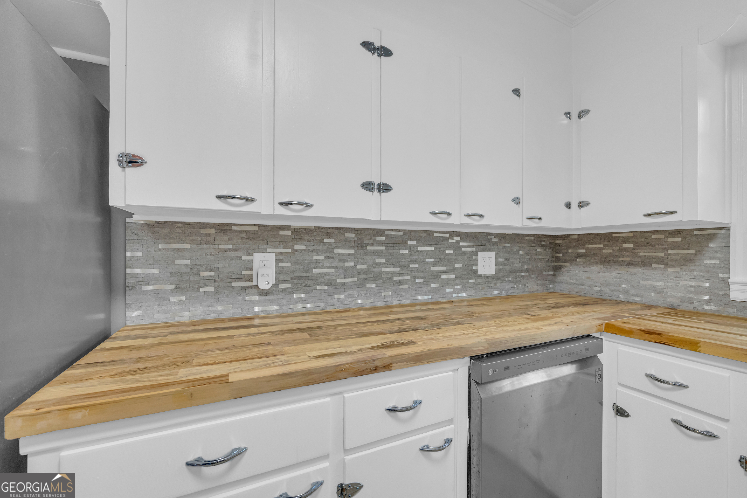 998 Rosedale Street Toccoa, GA 30577 - Photo 39 of 43 a view of a kitchen with white cabinets