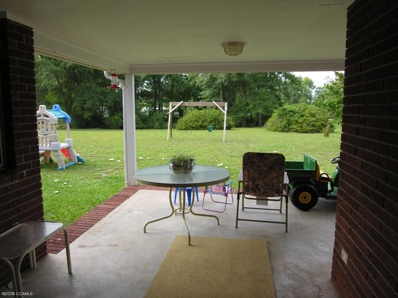 325 Nine Foot Road Newport, NC 28570 - Photo 11 of 13 Nice covered porch on rear
