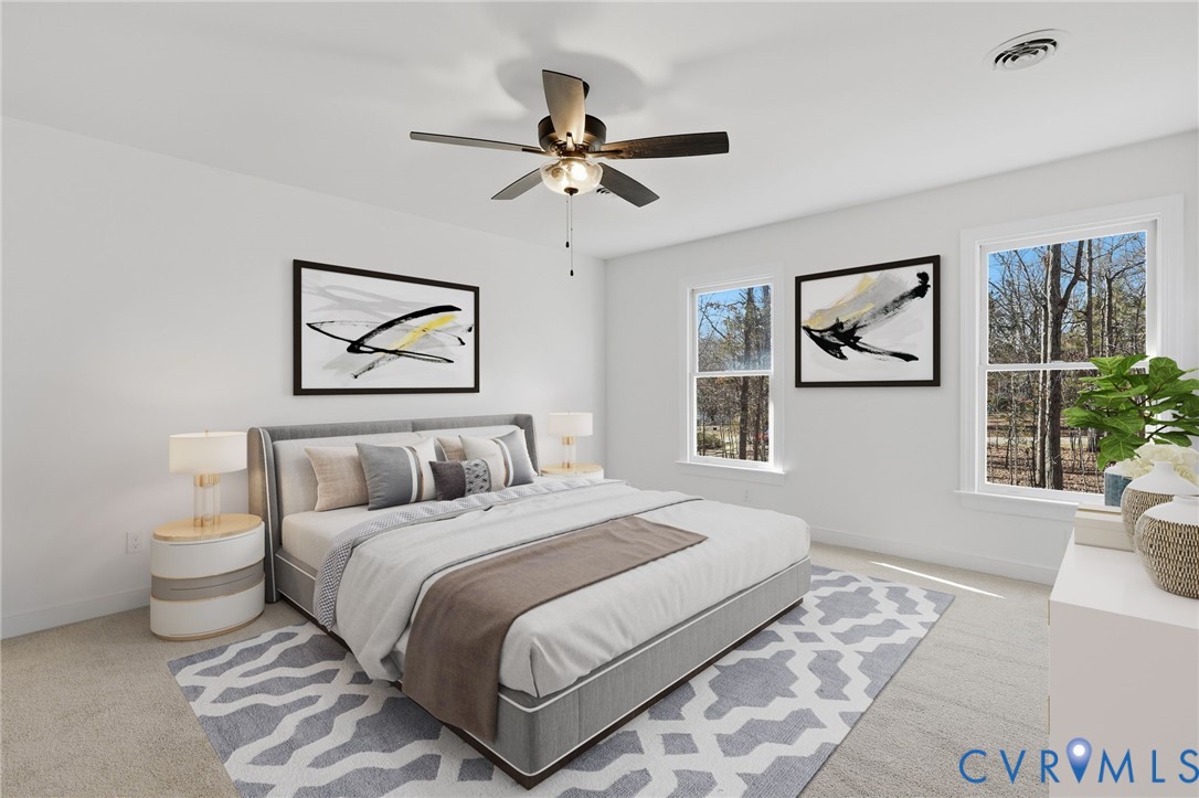 3264 Sherwood Ridge Way Powhatan, VA 23139 - Photo 18 of 40 a bedroom with a bed and a painting on the wall