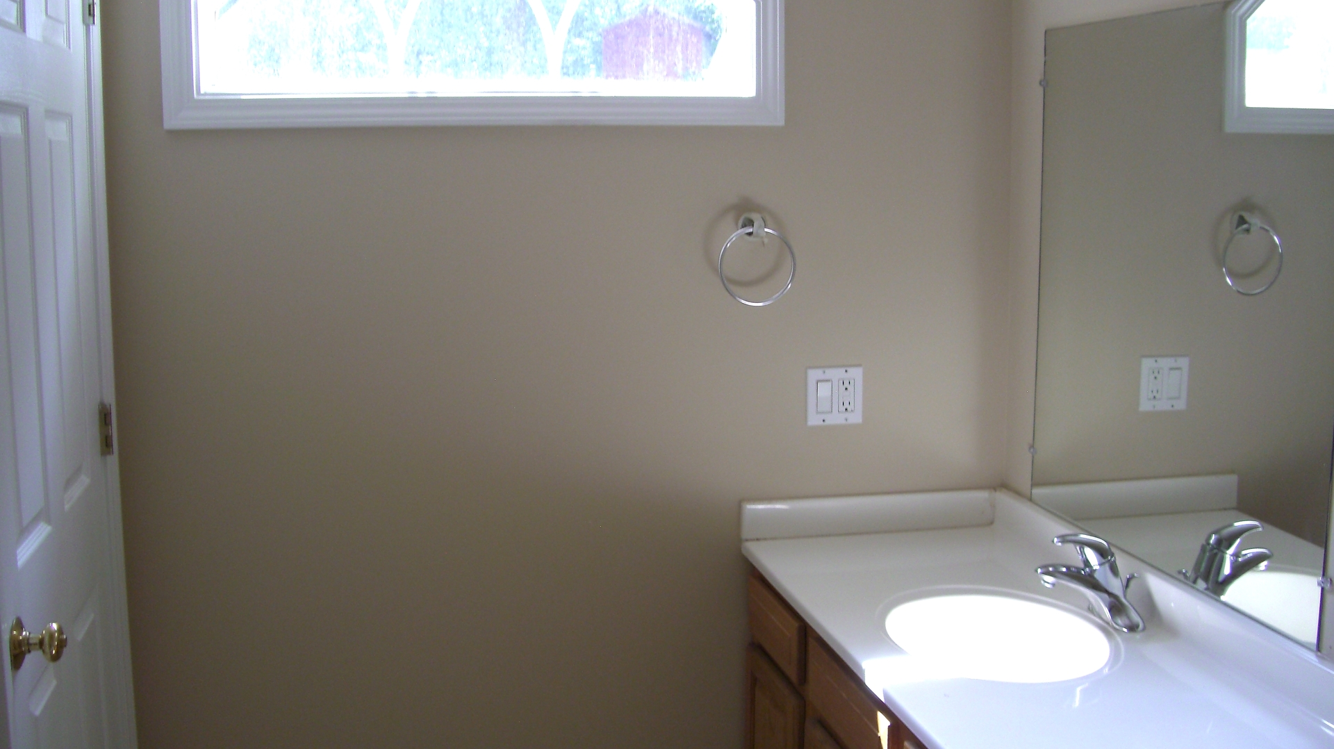 2055 North 35th Road Ottawa, IL 61350 - Photo 11 of 41 a bathroom with a granite countertop sink a mirror and a window