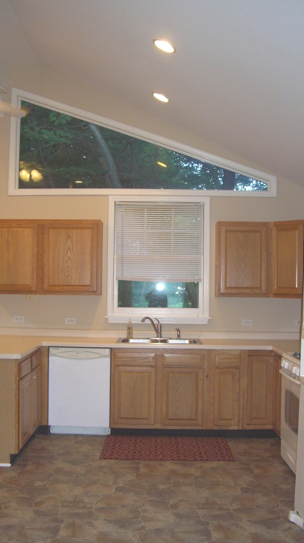 2055 North 35th Road Ottawa, IL 61350 - Photo 14 of 41 a view of a kitchen with a window