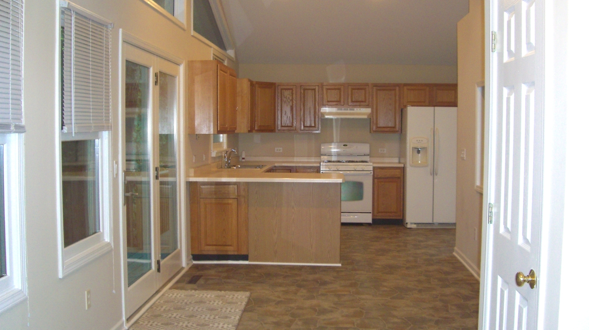 2055 North 35th Road Ottawa, IL 61350 - Photo 15 of 41 a room with stainless steel appliances a refrigerator and a window