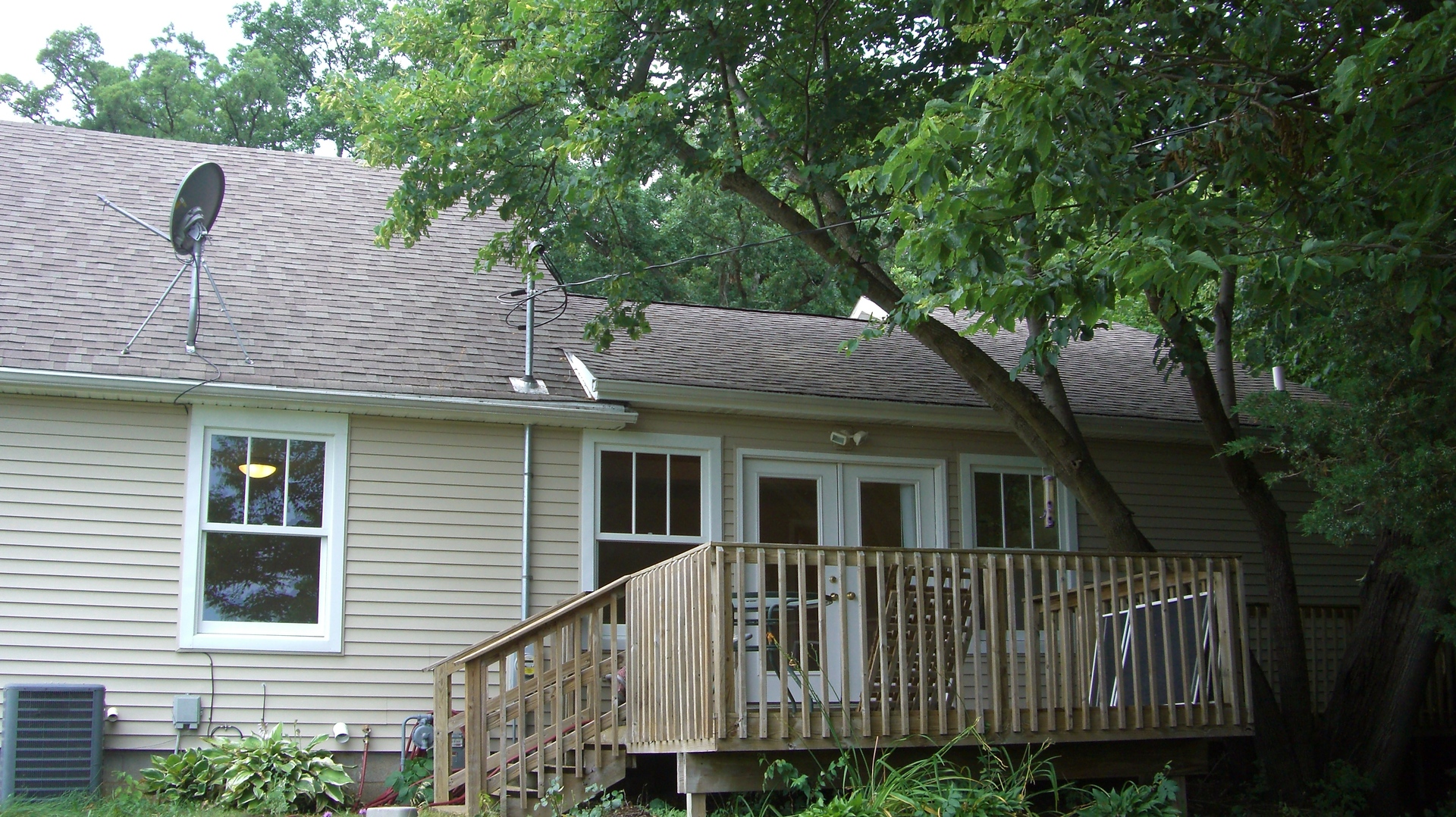 2055 North 35th Road Ottawa, IL 61350 - Photo 31 of 41 a front view of a house with a garden