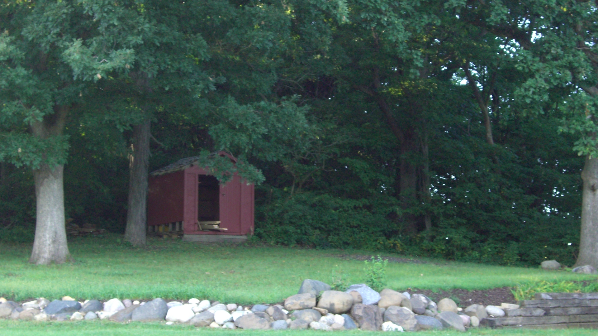 2055 North 35th Road Ottawa, IL 61350 - Photo 33 of 41 a view of a wooden house with a yard