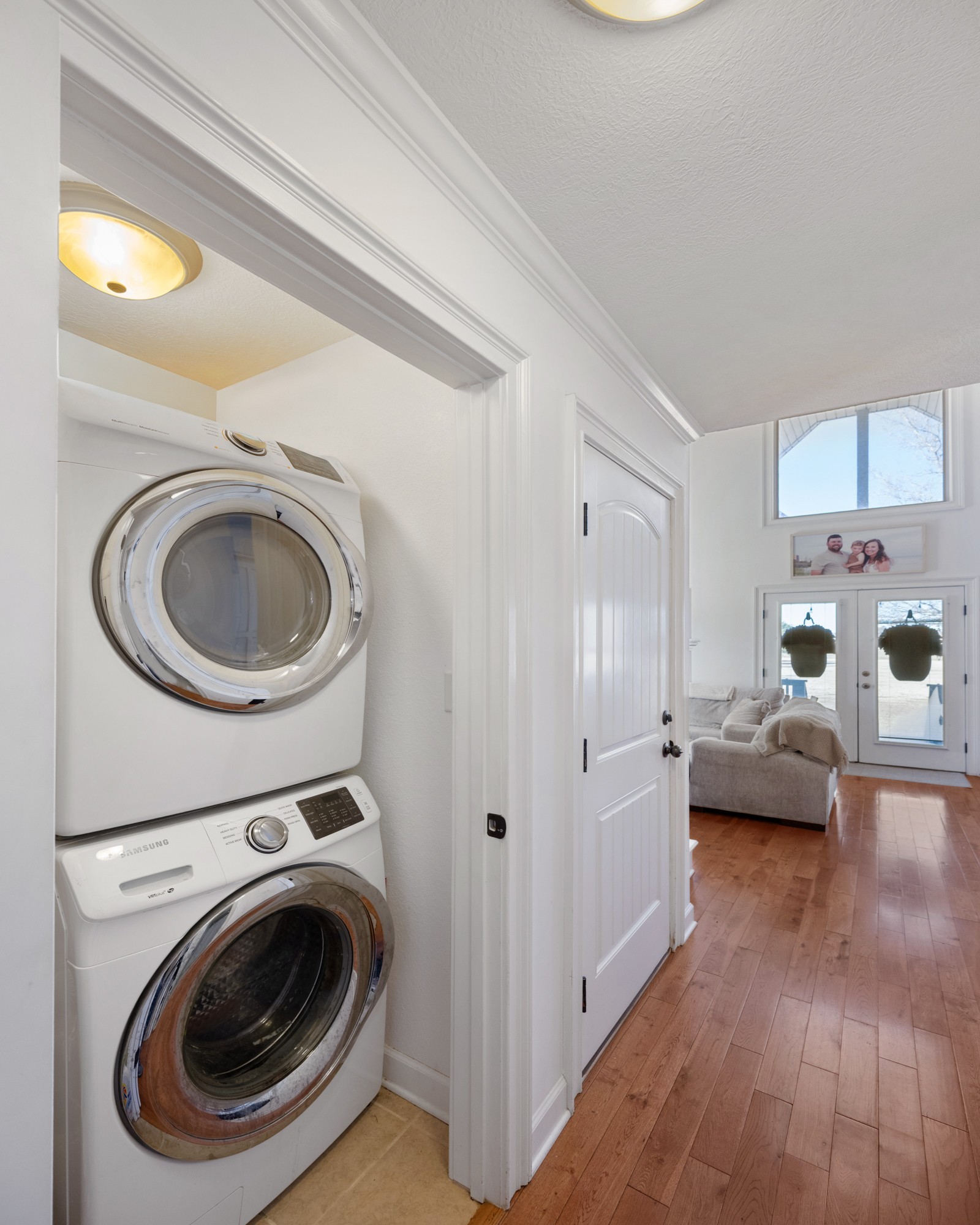222 Fairway Villa Lane Decaturville, TN 38329 - Photo 21 of 36 a view of a bedroom with washer and dryer