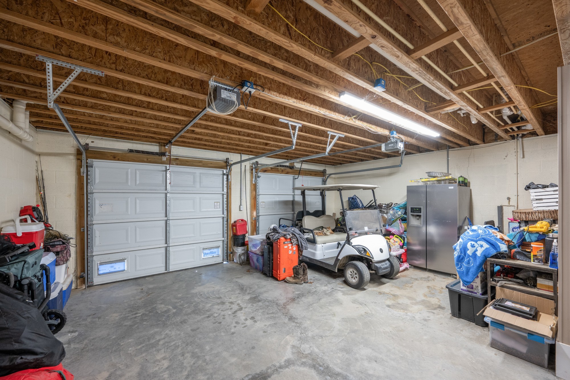 222 Fairway Villa Lane Decaturville, TN 38329 - Photo 29 of 36 a view of a garage with parked cars