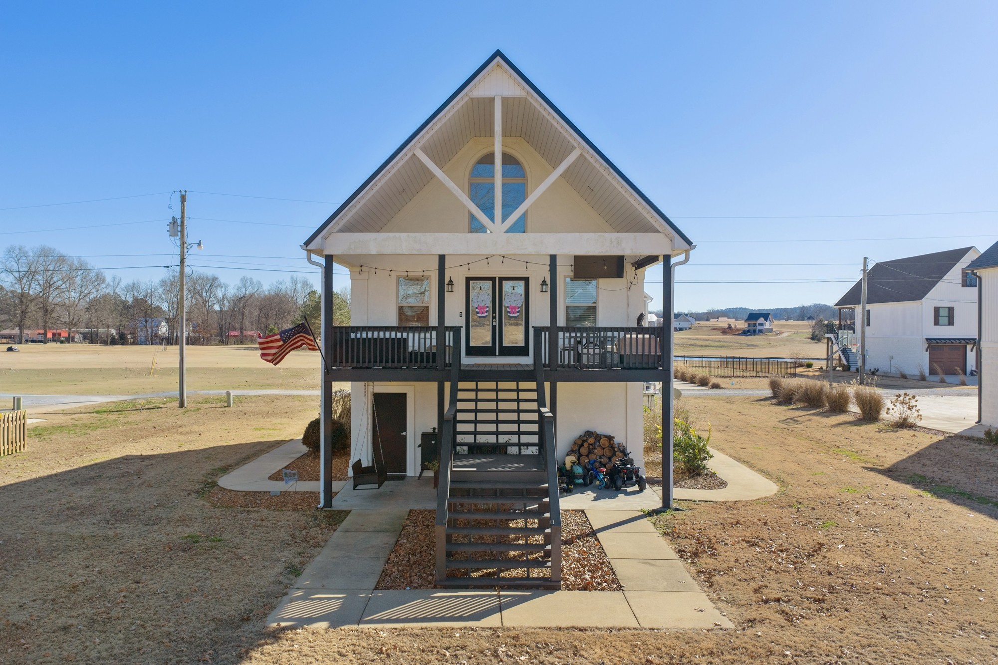 222 Fairway Villa Lane Decaturville, TN 38329 - Photo 3 of 36 a front view of a house with a yard