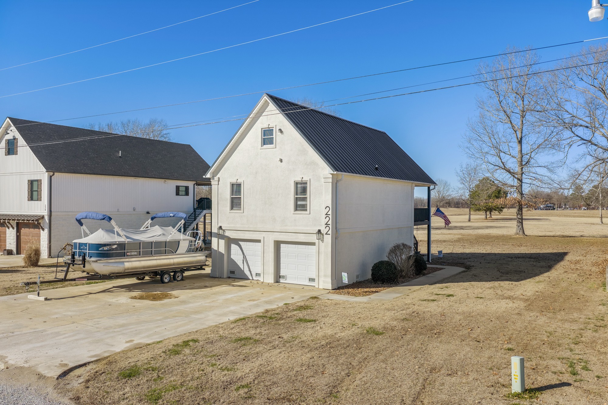 222 Fairway Villa Lane Decaturville, TN 38329 - Photo 6 of 36 a view of a house with a patio