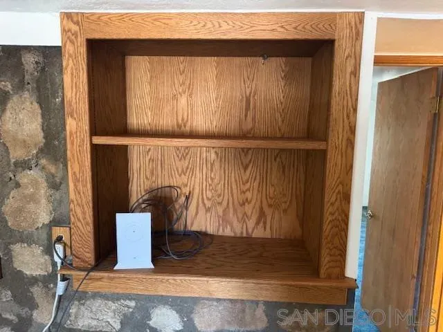 a backyard of a house with large trees