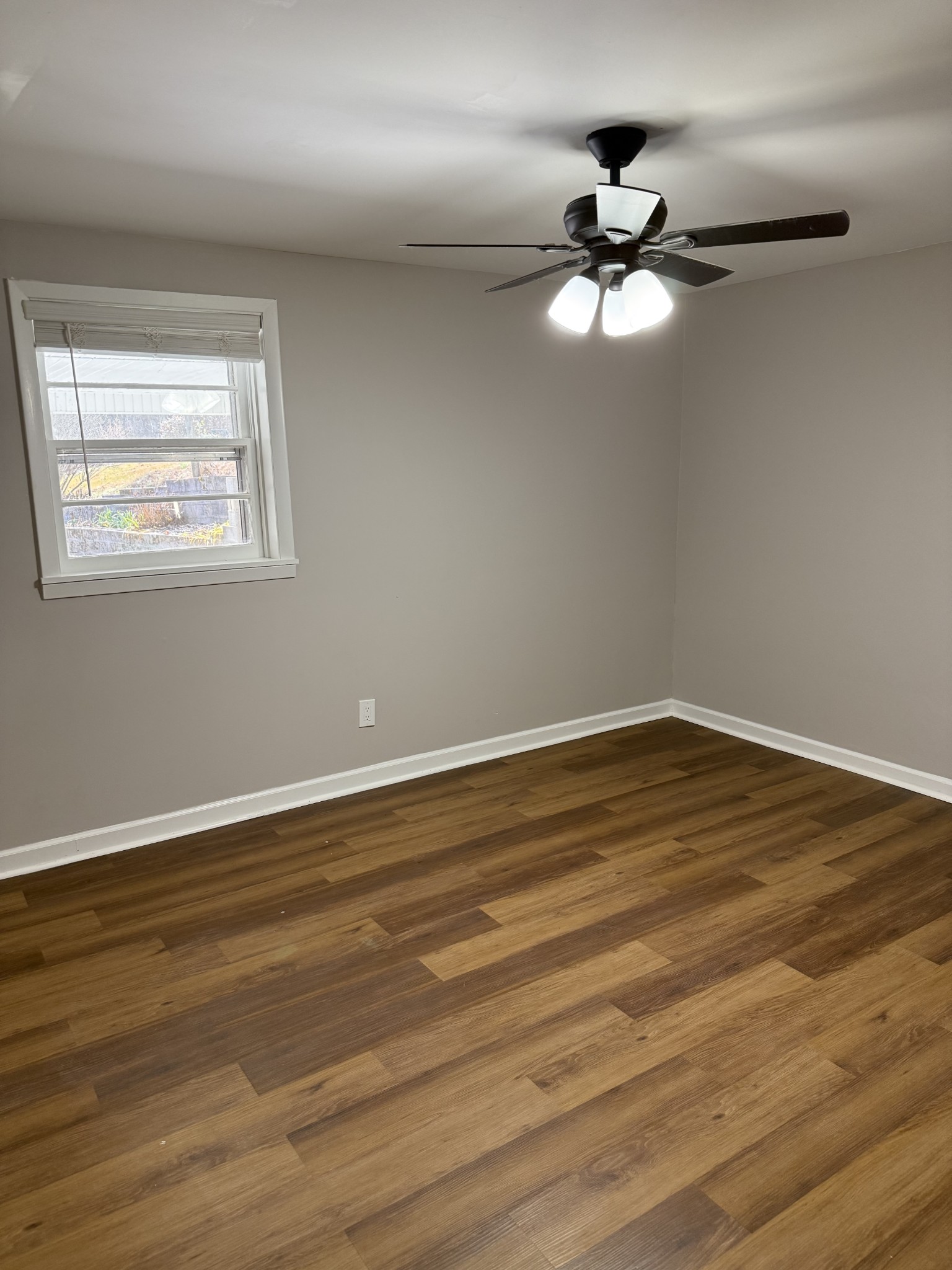 133 Mockerson Road Leoma, TN 38468 - Photo 12 of 20 a view of a room with wooden floor and a window