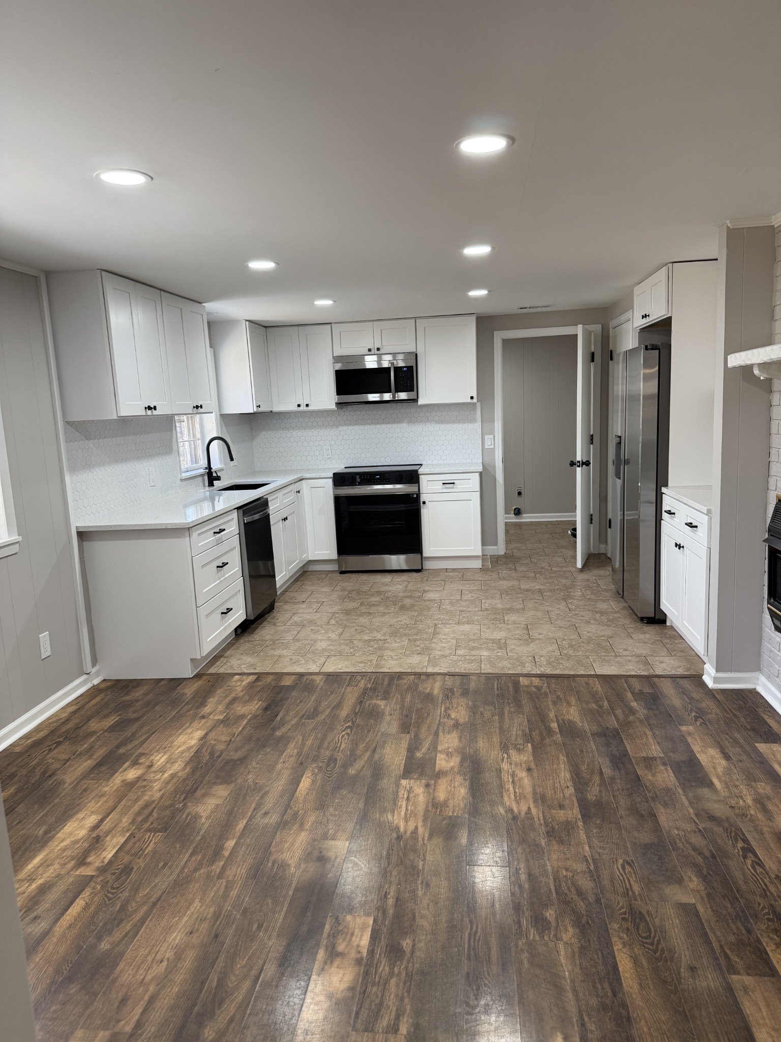 133 Mockerson Road Leoma, TN 38468 - Photo 2 of 20 a large kitchen with a stove a refrigerator and a sink