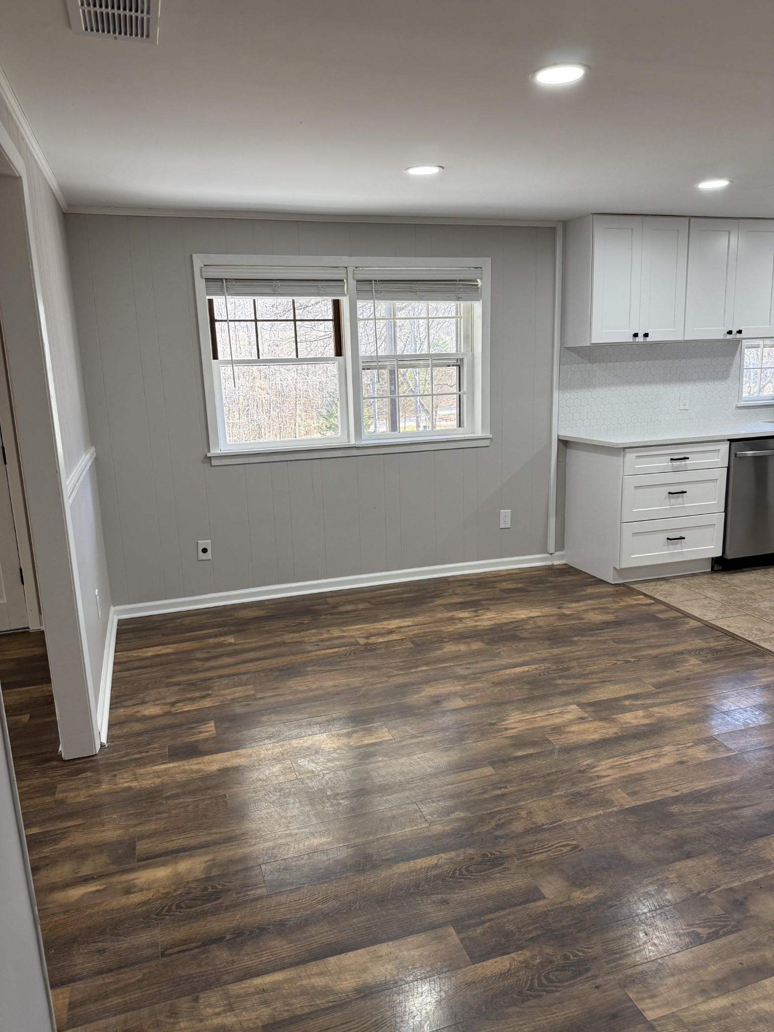 133 Mockerson Road Leoma, TN 38468 - Photo 5 of 20 an empty room with wooden floor and windows