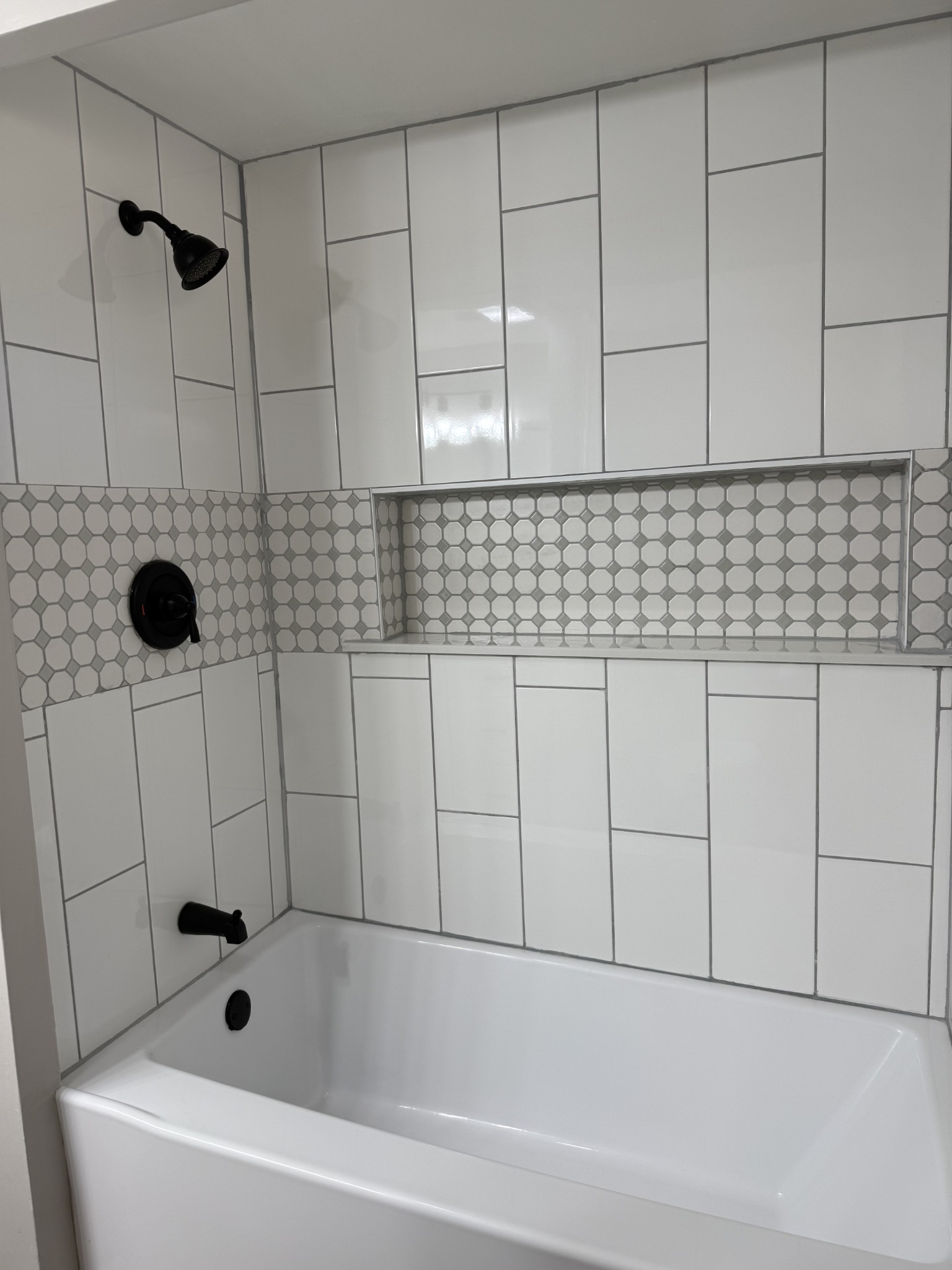 133 Mockerson Road Leoma, TN 38468 - Photo 6 of 20 a bathroom with a bathtub and shower