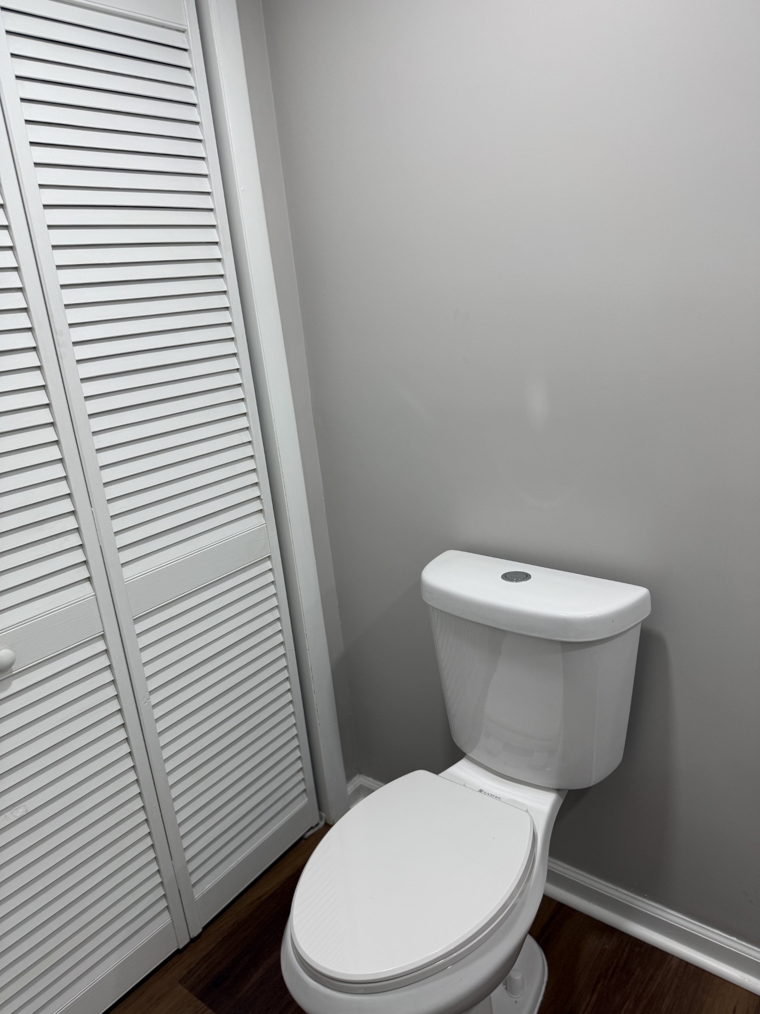 133 Mockerson Road Leoma, TN 38468 - Photo 8 of 20 a white toilet sitting next to a small sink