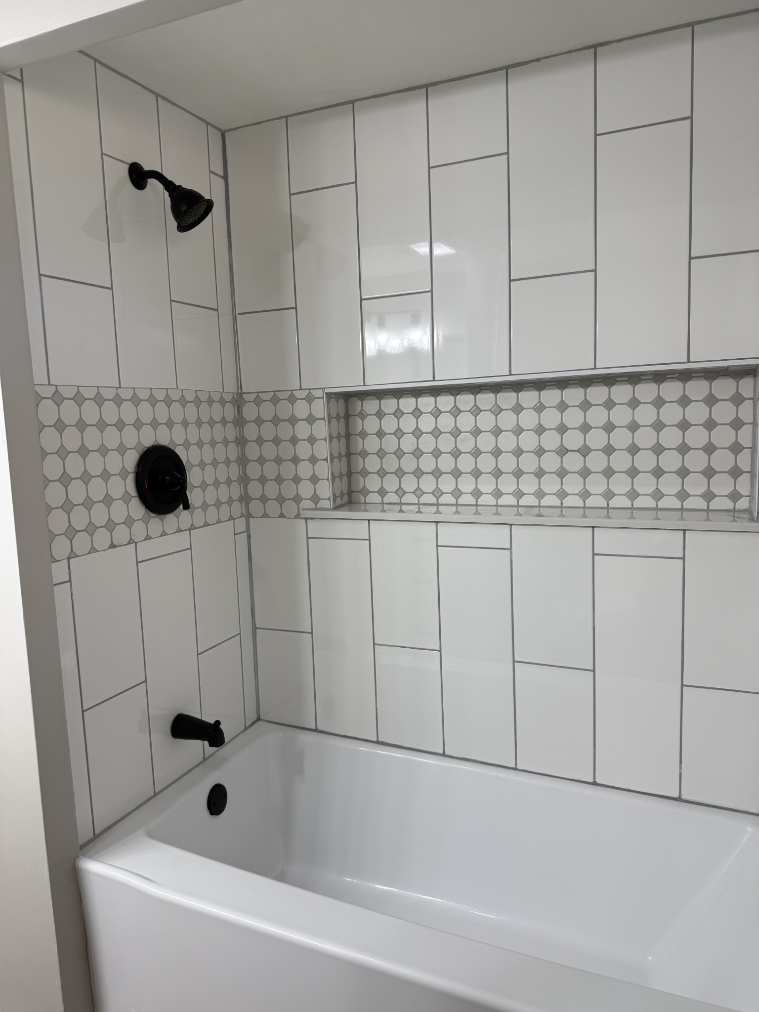 133 Mockerson Road Leoma, TN 38468 - Photo 9 of 20 a bathroom with a bathtub and shower