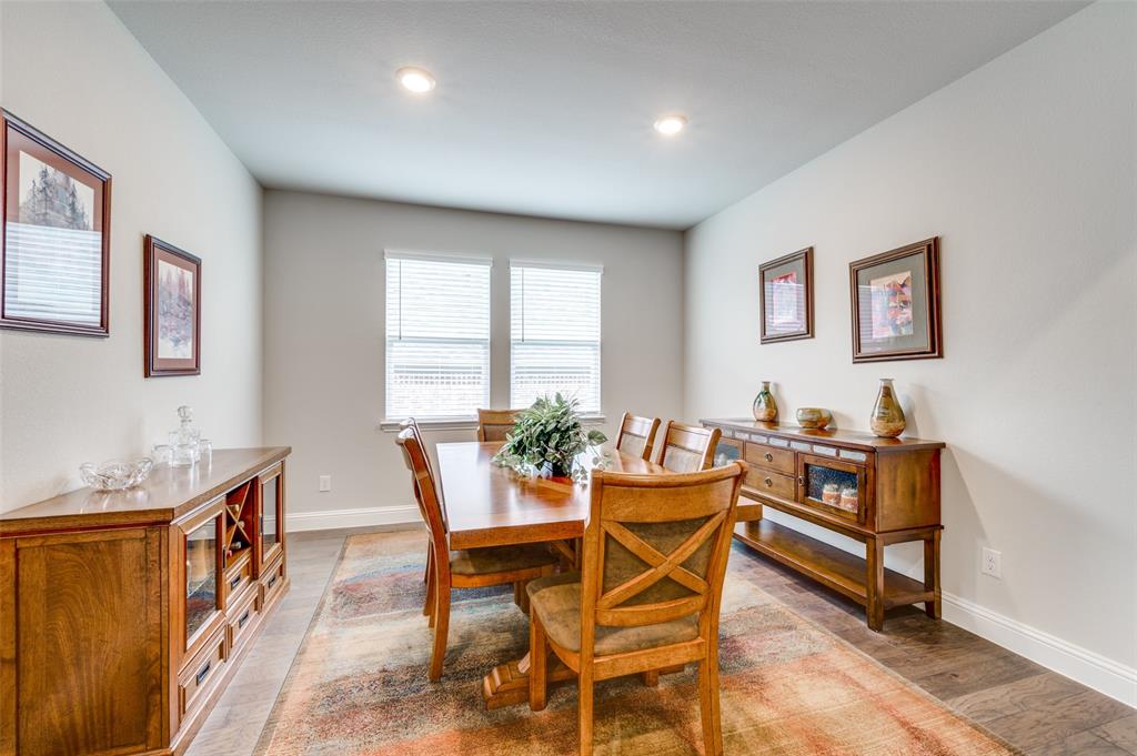 309 Savannah Lane Oak Point, TX 75068 - Photo 12 of 30 a dining room with furniture and window