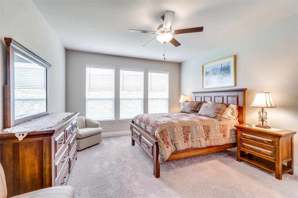 309 Savannah Lane Oak Point, TX 75068 - Photo 13 of 30 a bedroom with a bed and a window