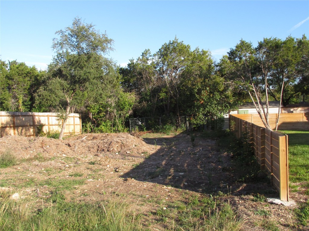 11103 1st Street Jonestown, TX 78645 - Photo 4 of 4 a view of a yard with large trees