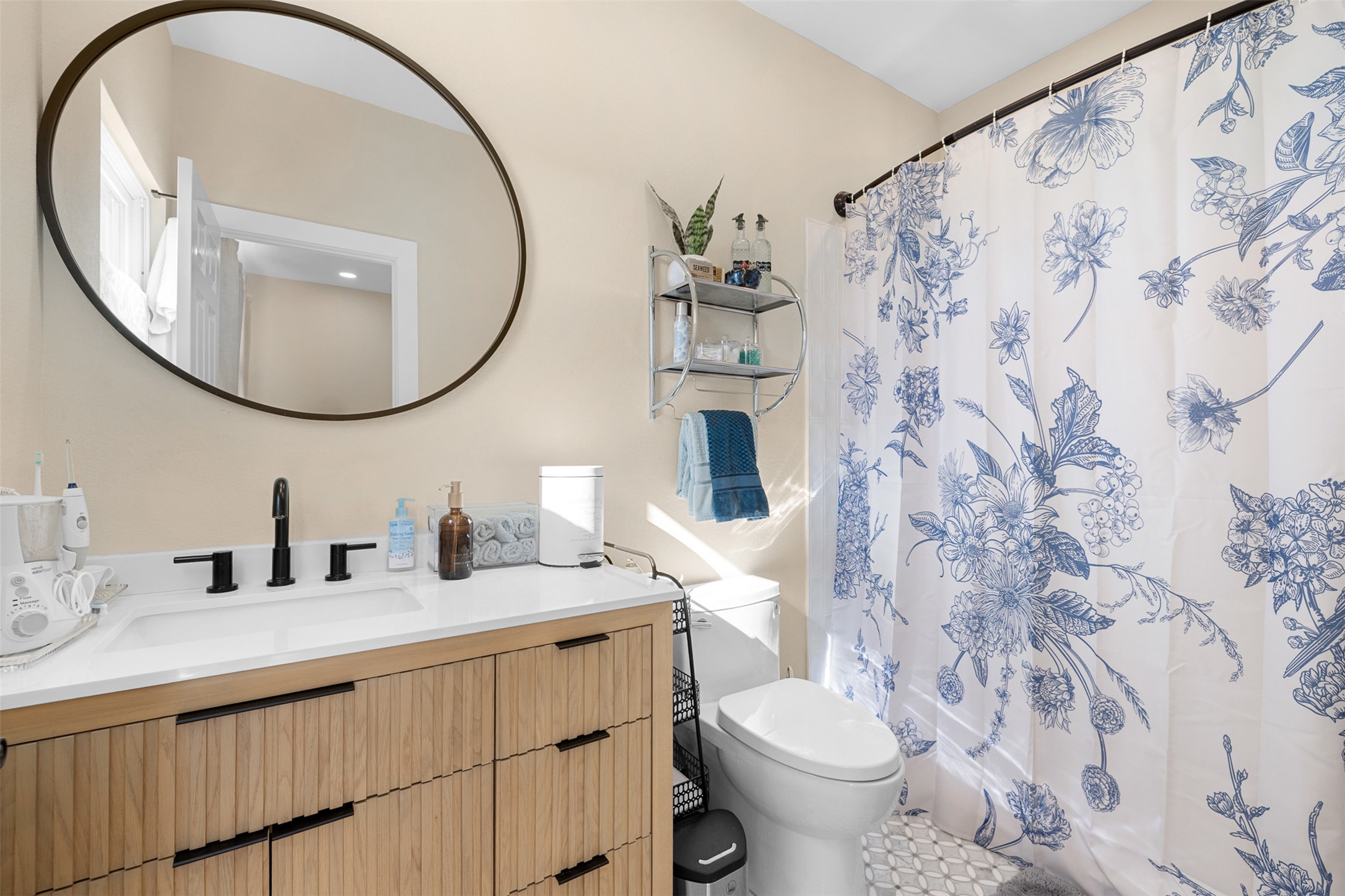 1759 Gotier Trace Road Paige, TX 78659 - Photo 21 of 40 a bathroom with a sink and a mirror