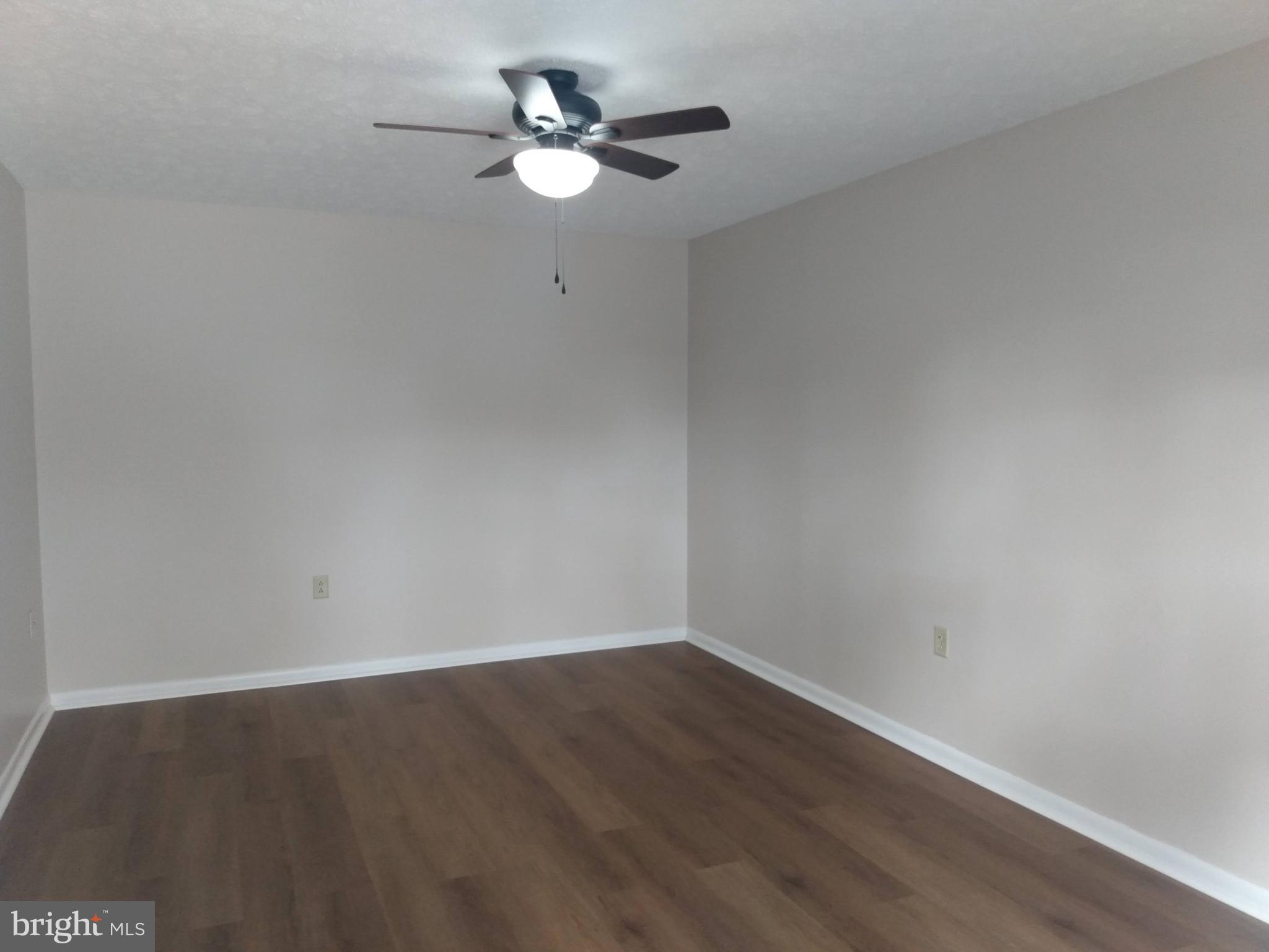 861 Buchanan Trail East, Unit 5 Greencastle, PA 17225 - Photo 7 of 14 a view of a big room with wooden floor